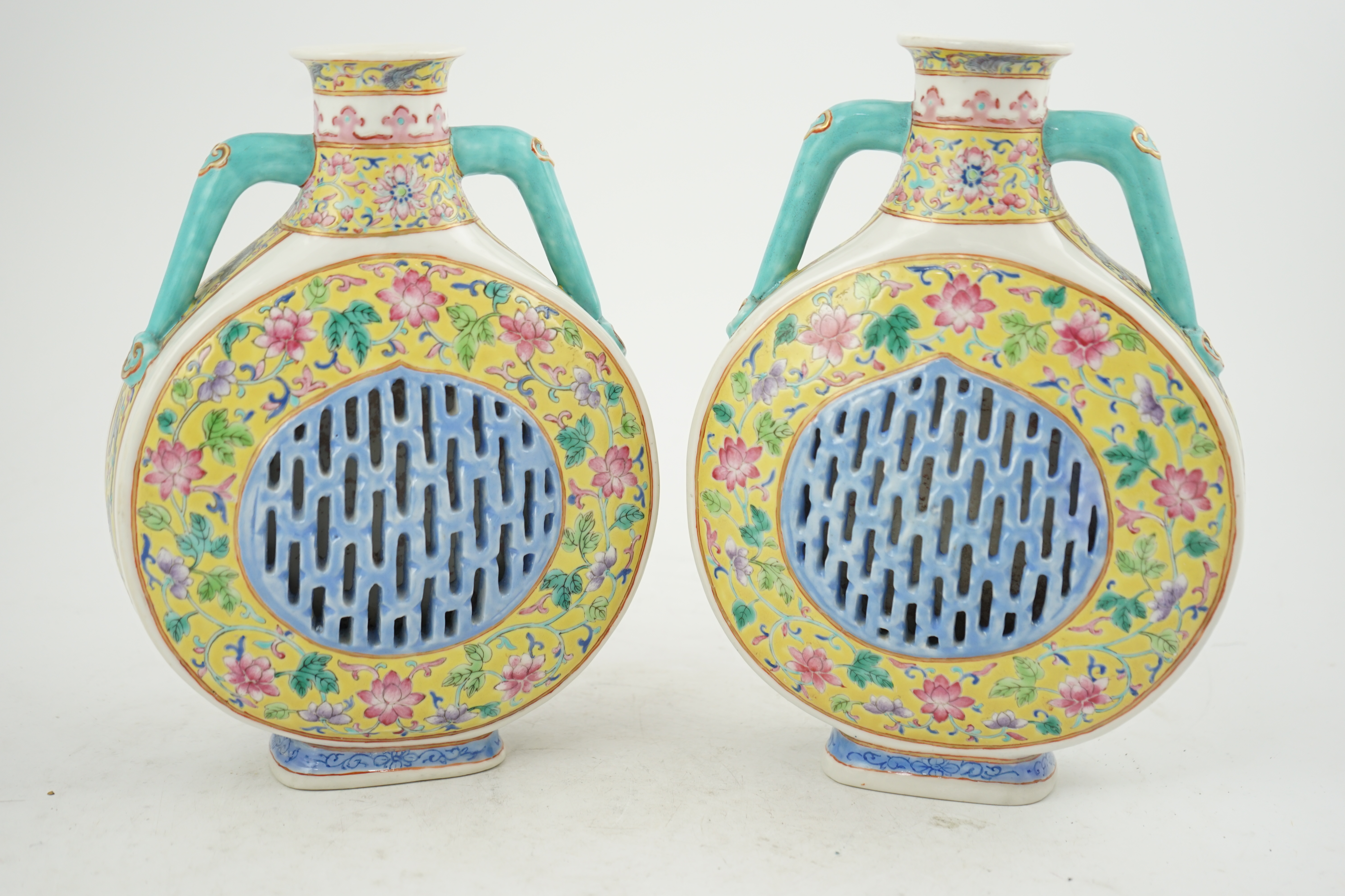 A pair of Chinese yellow ground double-walled moonflasks, bianhu, Daoguang marks, 19th century